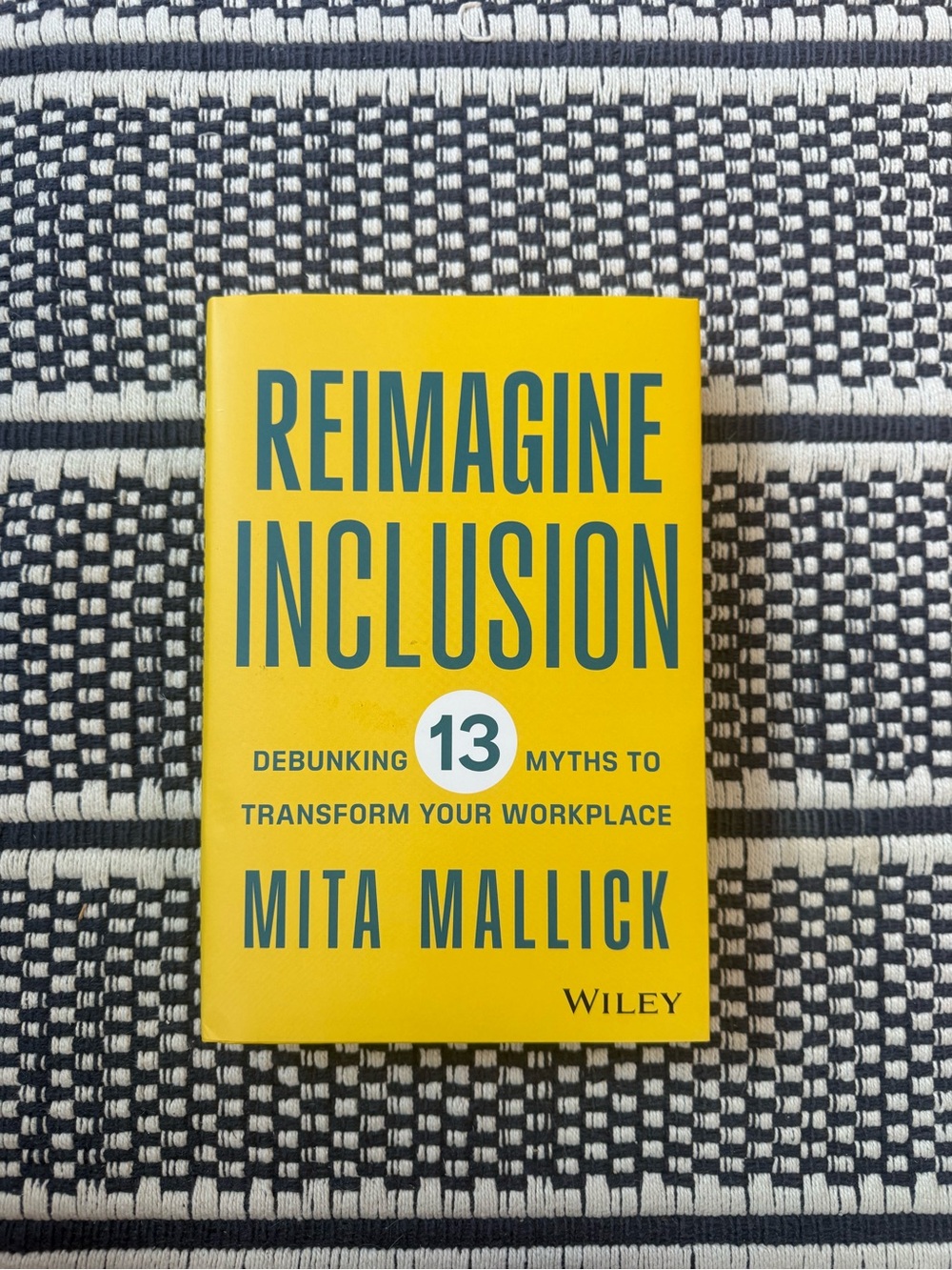 Reimagine Inclusion by Mita Mallick - Bright Yellow Hardcover